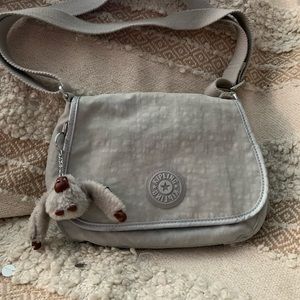 Adorable Kipling purse.